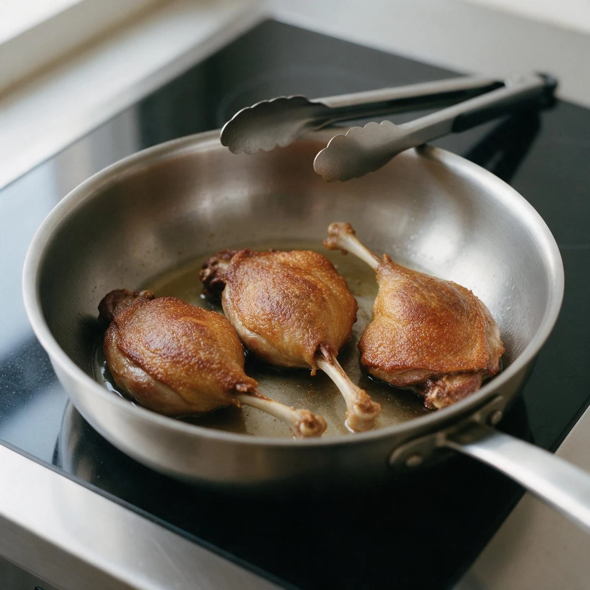 Brown the duck legs