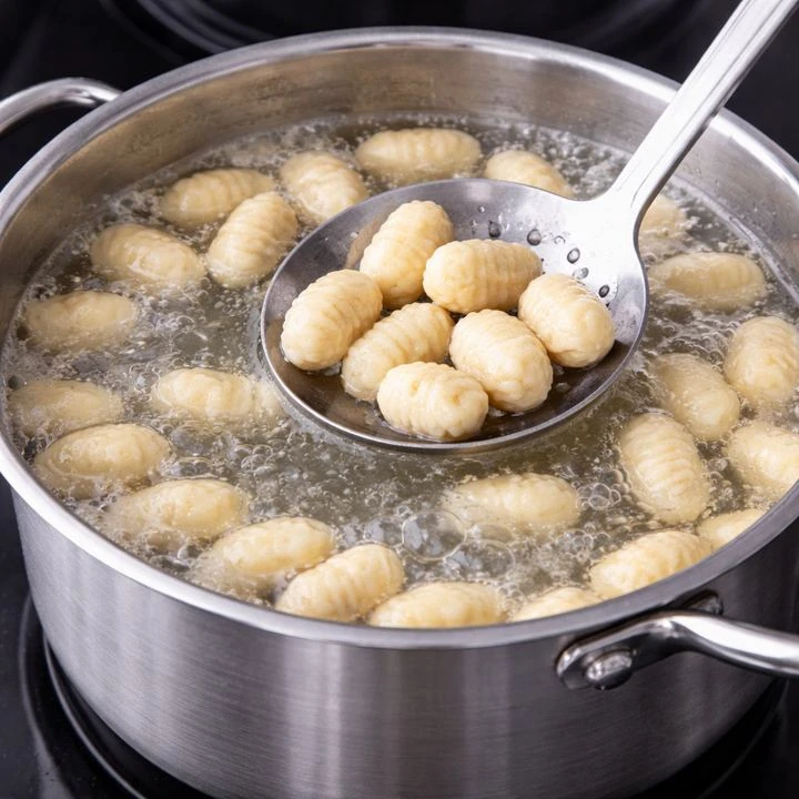 Poach and dry the gnocchi